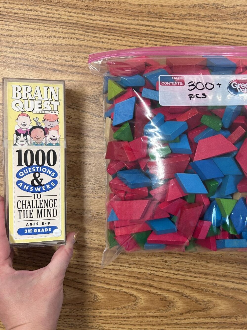 Brain Quest Game and 300 pieces of Wooden Tangrams